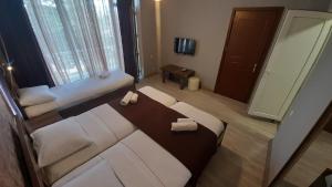 Letto o letti in una camera di Balu