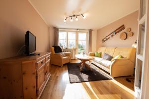 TV a/nebo společenská místnost v ubytování Bergwiese