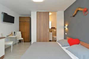 Posteľ alebo postele v izbe v ubytovaní Apartment Mirella 1745