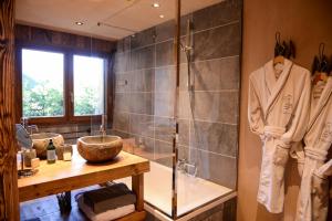 Ванная комната в Chalets Grands Montets