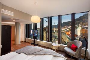 Кровать или кровати в номере Bergen Børs Hotel
