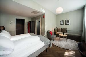 Кровать или кровати в номере Bergen Børs Hotel