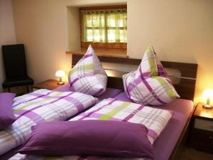 Ένα ή περισσότερα κρεβάτια σε δωμάτιο στο Ferienwohnung Elisabeth