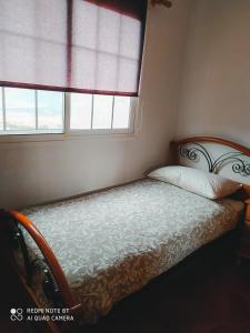 Кровать или кровати в номере Casa de Isabel