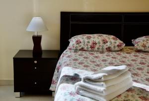A bed or beds in a room at Villa Lovisi