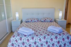 A bed or beds in a room at Villa Lovisi