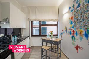 A kitchen or kitchenette at Genova XXV Aprile by Wonderful Italy
