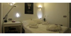 Łóżko lub łóżka w pokoju w obiekcie B&B Casa Alfareria 59