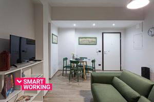 A television and/or entertainment centre at Genova XXV Aprile by Wonderful Italy