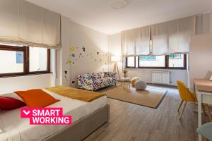 A bed or beds in a room at Genova XXV Aprile by Wonderful Italy