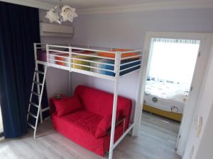 Кровать или кровати в номере izmir Tatil Evi Beach Resort Seferihisar