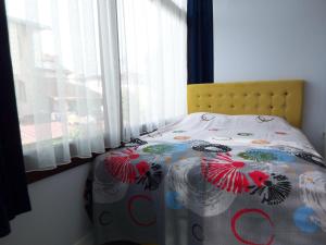 Кровать или кровати в номере izmir Tatil Evi Beach Resort Seferihisar