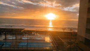 a view of the ocean from the balcony of a hotel at Paraíso Frente ao Mar in Barra Velha
