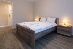 Postel nebo postele na pokoji v ubytování Apartamenty Spokojna 24C