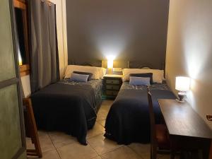 Cama o camas de una habitación en La Fusteria del Casat