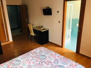 Postel nebo postele na pokoji v ubytování Hotel Almoradi