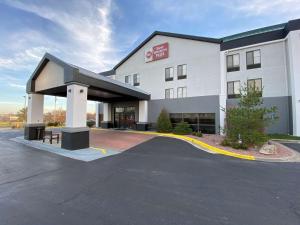 a rendering of a hotel with a parking lot at Best Western Plus Kansas City Airport - KCI East in Kansas City