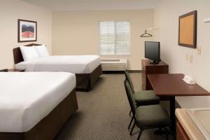 Postel nebo postele na pokoji v ubytování WoodSpring Suites Waco near University