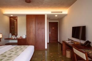 TV a/nebo společenská místnost v ubytování Penh House Hotel