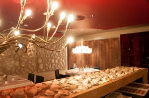 Posezení v ubytování Hotel AF Pesquera
