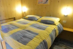 Postel nebo postele na pokoji v ubytování Residence Bucaneve