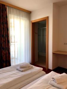 Posteľ alebo postele v izbe v ubytovaní Apartment Heijerhof - Top 6