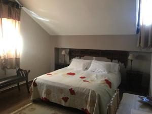 A bed or beds in a room at Albus Albi
