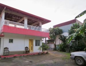 a house with a red and white at Perlies Inn NEW Barkada House with NETFLIX and WIFI in Tanay