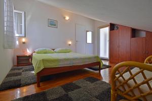 Posteľ alebo postele v izbe v ubytovaní Apartments Dinka Miličić