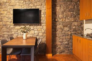 Kuchyň nebo kuchyňský kout v ubytování El Refugi de les Basses Apartament + 18 fotografií