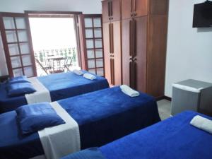 Katil atau katil-katil dalam bilik di Suites economicas