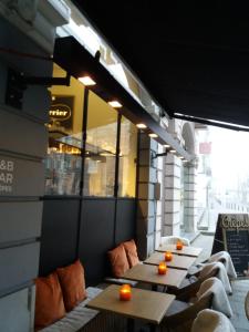 a row of tables on a building with oranges on them at Brabantdam 44 self check in in Ghent