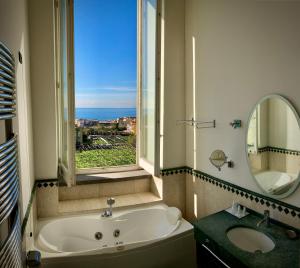 Ванна кімната в Miglio d'Oro Park Hotel