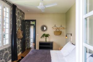 Postel nebo postele na pokoji v ubytování Hotel Home Arcachon