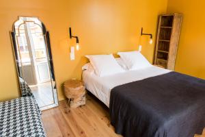 Postel nebo postele na pokoji v ubytování Hotel Home Arcachon