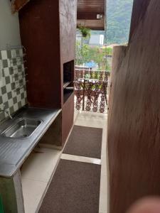 Billede fra billedgalleriet på Suites economicas i Guarujá