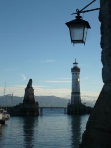 a lighthouse and a light house on the water at Ferienwohnung - Ferien in der Grub in Lindau