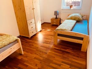 Кровать или кровати в номере Moderne Wohnung in Eberswalde