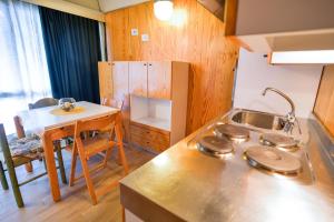 Dapur atau dapur kecil di Res.Albarè/Solaria Apt.Solandra