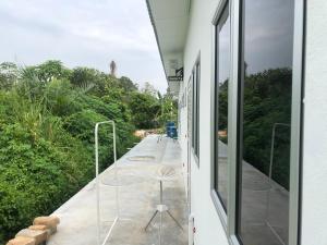 En balkong eller terrass på Homestay Warisan Nenda