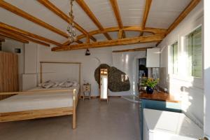 Posteľ alebo postele v izbe v ubytovaní Luxury Suites Poseidon