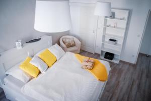 Posteľ alebo postele v izbe v ubytovaní Malasits Art Home