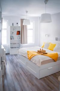 Ένα ή περισσότερα κρεβάτια σε δωμάτιο στο Malasits Art Home