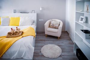 Posteľ alebo postele v izbe v ubytovaní Malasits Art Home