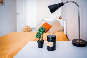 Posteľ alebo postele v izbe v ubytovaní Malasits Art Home