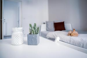 Posteľ alebo postele v izbe v ubytovaní Malasits Art Home