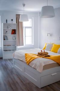 Posteľ alebo postele v izbe v ubytovaní Malasits Art Home
