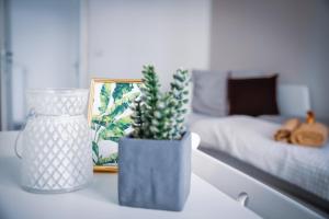 Posteľ alebo postele v izbe v ubytovaní Malasits Art Home