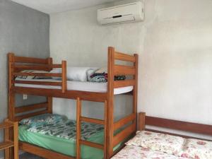 מיטה או מיטות בחדר ב-Takeo's House