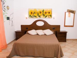 Кровать или кровати в номере Vistamare